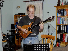 Clyde Schipke on electric guitar